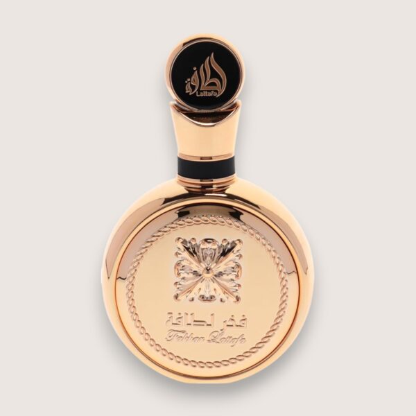 Flacon or et luxueux du parfum Fakhar Lattafa Gold pour femme - fragrance florale fruitée et sophistiquée - MADOSTYLE